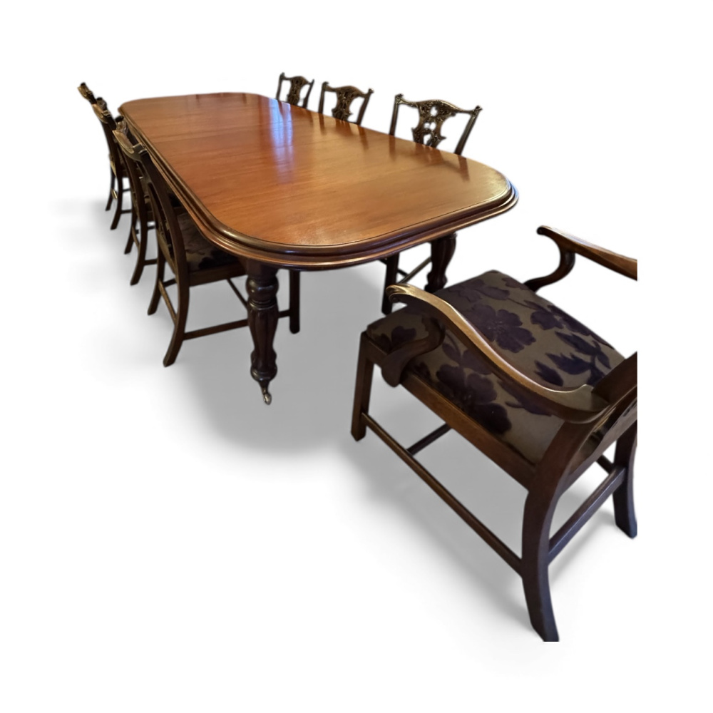 Extendable dining table, 6 chairs and 2 carvers